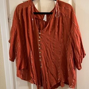 Terra Cotta tie front top with gold stripes.